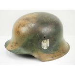 Wehrmacht: Stahlhelm M42 getarnt.