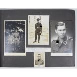 Fotoalbum eines SS-Soldaten "DEUTSCHLAND".Blauer Einband, 256 Fotos, diverse Formate, je SEite mit