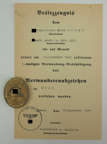 Verwundetenabzeichen, 1939, Gold, mit Urkunde für einen SS-Scharführer der SS-Art. Ausb. u. Ers.