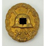 Verwundetenabzeichen, Legion Condor, in Gold.Holh geprägt, vergoldet, an Nadel.Zustand: I-II