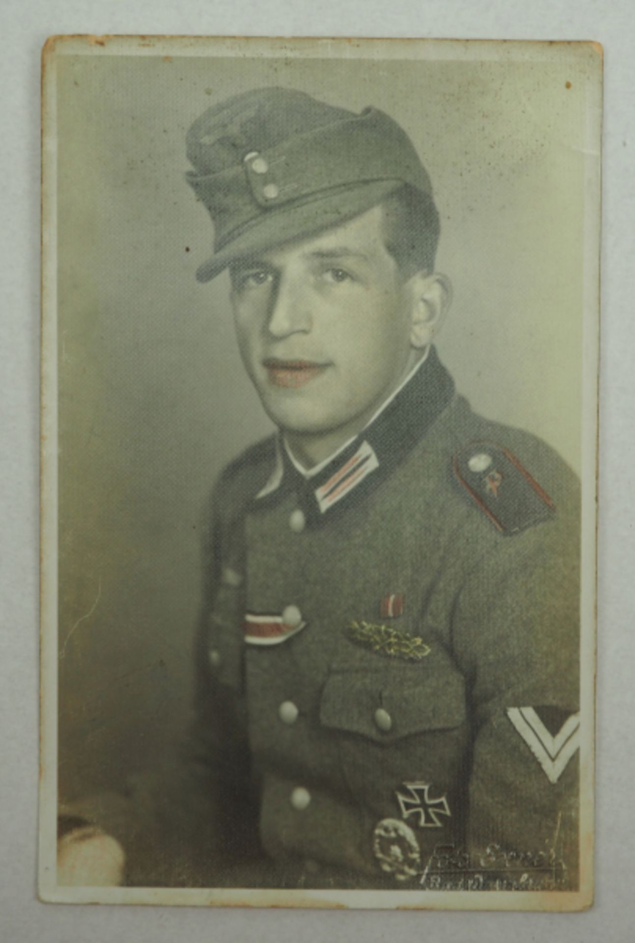 Koloriertes Foto eines Panzerjägers.Studio Aufnahme.Zustand: II