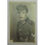 Koloriertes Foto eines Panzerjägers.Studio Aufnahme.Zustand: II