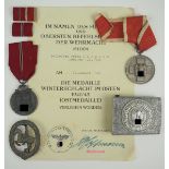 Nachlass eines Wehrmacht-Soldaten.1.) Medaille Winterschlacht im Osten, dazu Urkunde, 2.)