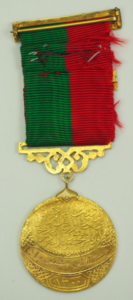 Türkei: Imtiyaz-Medaille, in Gold, mit Säbel- und Datumsspange des Mustafa Raschid Pascha.Gold, - Image 4 of 5