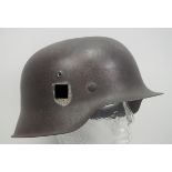 Waffen-SS: Stahlhelm M 42.Glocke mit kleinen Resten der Originallackierung, SS Emblem zu ca. 70 %