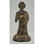 Figur eines buddhistischen Mönch.Bronze mit Vergoldung, die Lothusblüte die er in der Hand hält