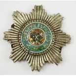 Russland: Mützenbeschlag für Unteroffiziere.Silberner Stern, lackiert, mit Splinten.Zustand: II