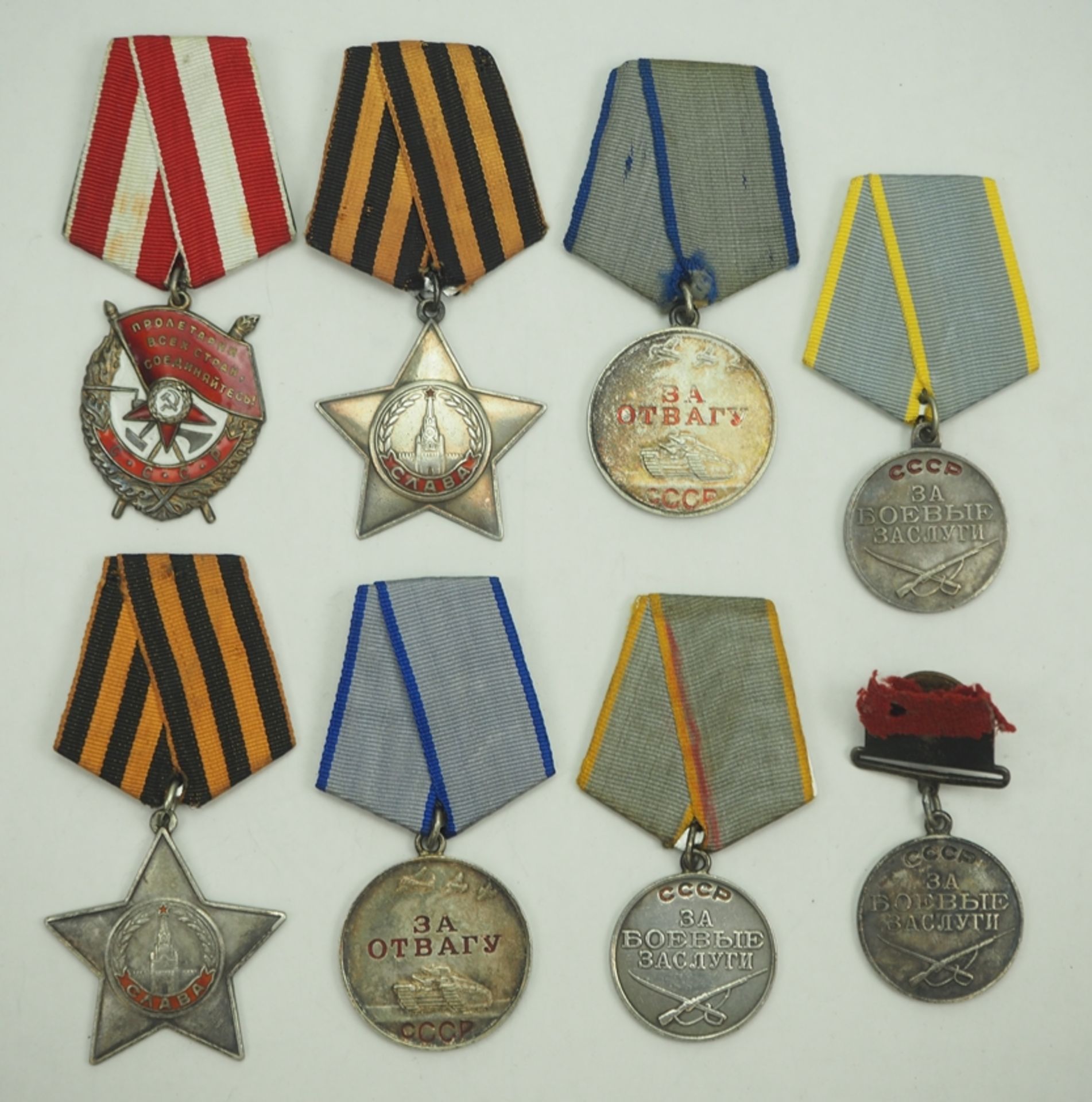 Sowjetunion: Lot von 8 Tapferkeits- und Verdienstauszeichnungen.