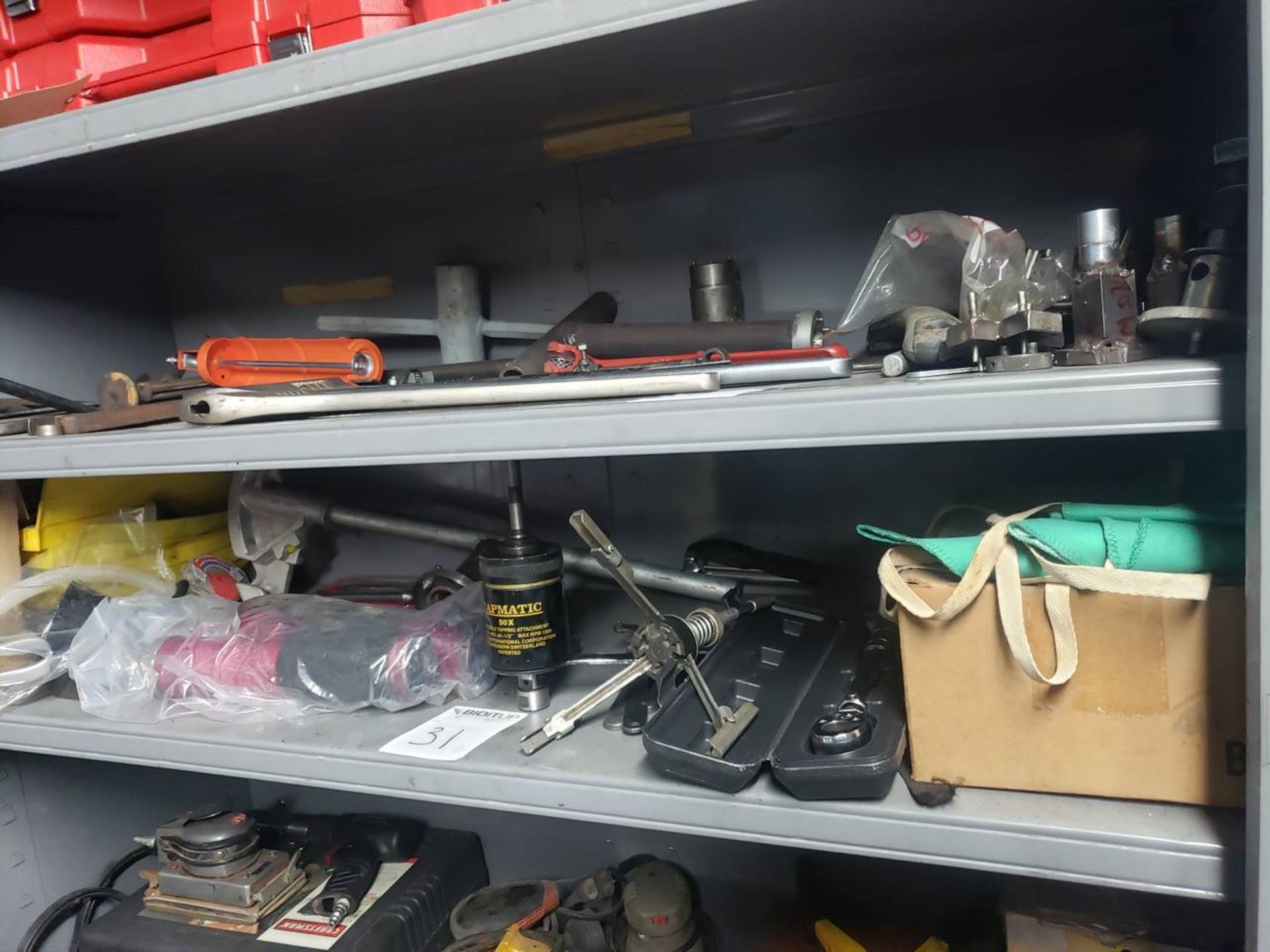 Shelf of Assorted Tools Torque Wrench, Honer, (3) Aluminum Grease Canisters, (1) Pipe Bender &