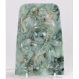 Chinese hardstone panel, carved with a figure above a chained figure to the floor, 14cm