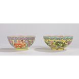 Two Chinese porcelain bowls, both with yellow ground and dragon decoration, housed in fitted