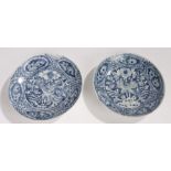 Pair of Zhangzhou ("Swatow") blue and white plates, painted with a pair of phoenixes amongst