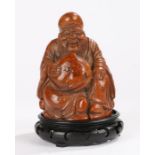 Chinese carved bamboo figure, of a seated bearded figure, 16cm high, together with a standSome