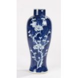 Chinese porcelain vase, in blue and white with a flowering branch, 28cm highOverall good order