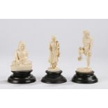 Three Japanese ivory Okimonos, early 20th Century, to include a seated Buddha, a figure balancing