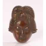 Japanese Meiji period bronzed metal miniature mask of a geisha, 65mm high Overall good condition