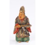 Japanese polychrome caved boxwood netsuke, by Nakamura Shuzan, of a man in court robes, signed to