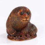 Japanese carved wood netsuke, Edo period, of a puppy on a shell, 3.3cm highOverall good order