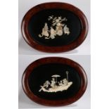 Pair of Japanese mother of pearl and bone panels, the pieces set to black lacquer depicting