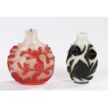 Chinese glass snuff bottle, in red overlay decoration depicting trees and a bird, 7.5cm high,