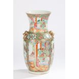 Chinese Canton porcelain vase, Qing dynasty, 19th Century, decorated with figures among buildings