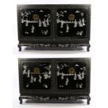 Pair of Chinese black lacquer cabinets, the tops decorated with birds on foliate branches above