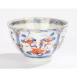 Chinese tea bowl, Qing dynasty, 19th Century, with red and blue decorated flowers, 75mm diameter