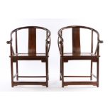 Pair of Chinese armchairs, the arched top rail with undulating splat above the solid seat and