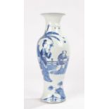 Chinese blue and white porcelain vase, Qing dynasty, with figures in a garden by a fence, six