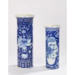 Chinese porcelain cylinder vase, in blue and white decorated with vases on stands, tables,