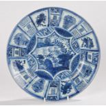 Chinese porcelain dish, Qing dynasty, blue and white decoration with a central lake scene and