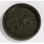 Japanese Edo period bronze mirror, decorated with trees and storks, 12.5cm diameter