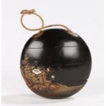 Japanese three case lacquered inro, of circular form decorated with gilt pagodas and mother of pearl