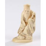 Japanese Meiji period ivory okimono, carved as a standing figure with a long beard, 9.5cm