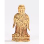 Chinese Qing Dynasty ivory gaming piece, of a standing figure holding his belt above a plinth