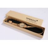 Timeboo bamboo wristwatch, the signed dial with baton markers, on a long cork bracelet, the case