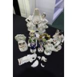 Collection of 19th Century Staffordshire pottery, to include Eva gally laughing with Uncle Tom, a