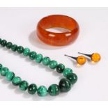 Graduated malachite bead necklace, pair of white metal and amber effect pendants, amber effect