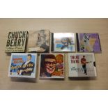 Collection of CD box sets. artists to include Chuck Berry, Richie Valens and Buddy Holly