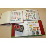 Three stamp albums, Afghanistan to Yugoslavia, loose stamps and cigarette cards (qty)