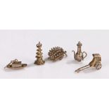Four sterling silver Chinese inspired charm bracelet charms, comprising rickshaw, tower, boat and