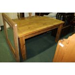 Pine dining table raised on substantial square legs, 153cm x 89cm
