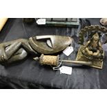 Brass deity figure depicting a seated Ganesh, together with a Tibetan Buddhist prayer wheel, with