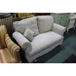 Two seat drop end settee, upholstered in a grey material