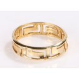 Gold coloured metal ring, with pierced Greek key decoration, stamped 525 to interior of band, 2.9g