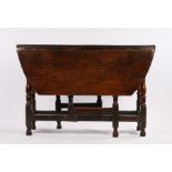 18th Century oak drop-leaf gate leg table, the leaves reduced in length, with frieze drawer, on