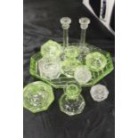 1920's glass dressing table set, in clear glass, together with a green glass example, (qty)