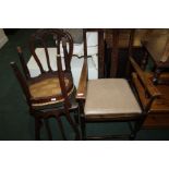 Early 20th Century carved oak chair, together with a pair of upholstered dining chairs (3)