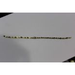 9 carat gold bracelet set with emeralds and diamonds, 5.7g AF