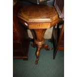 Victorian walnut and marquetry inlaid octagonal sewing box, the hinged lid opening to reveal a